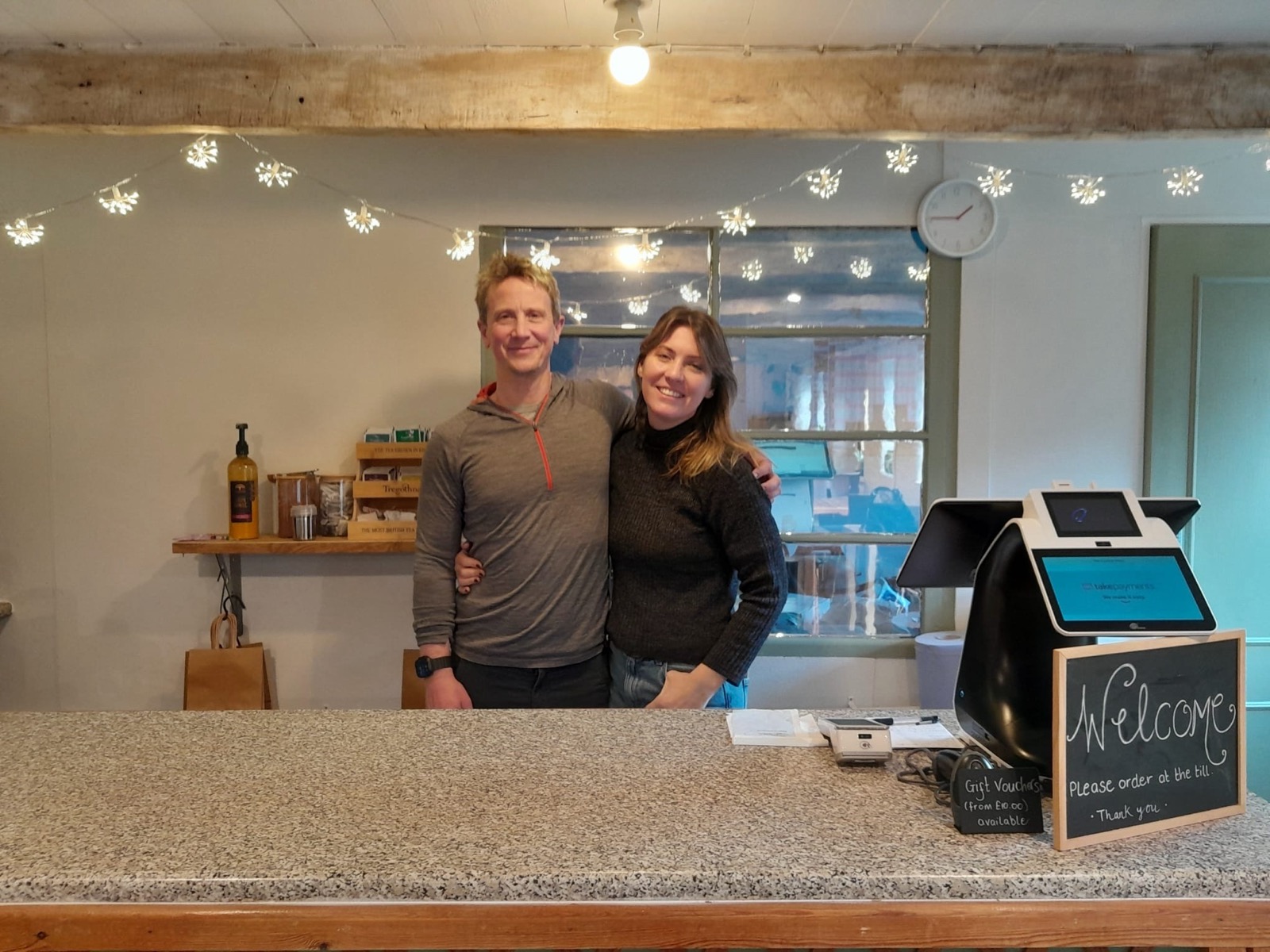 Ben and Kayliegh Scott together behind the counter